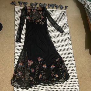 Embroidered mesh dress. Floral with black background. Size XS.